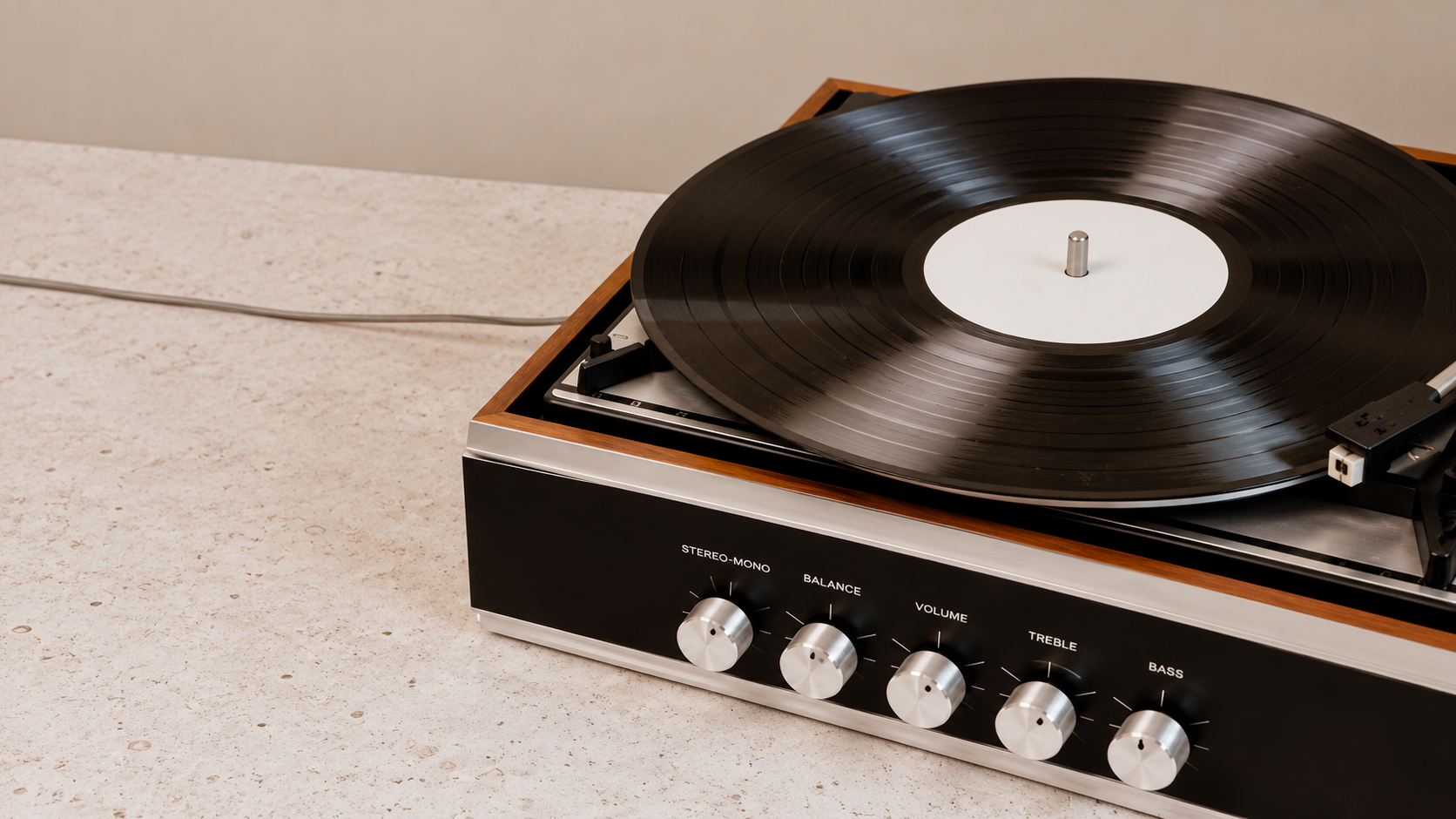 Black vinyl record on a vintage turntable
